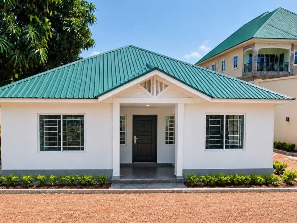 Outside: the roof, from the ground. The green metal roof, from the ground (sample image)